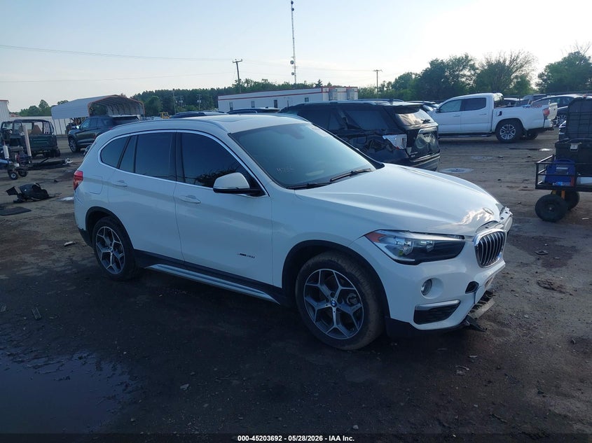 2018 BMW X1 VIN WBXHT3C31J5K22202 IAAI salvage auction — FRONT & REAR, Salvage Title, sold $3,850 on 2026-07-07 (photo 1)