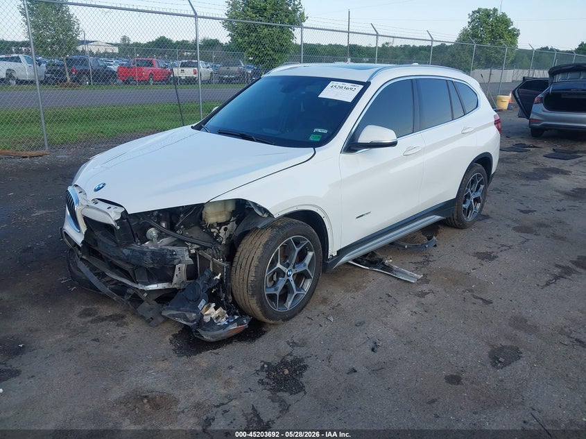 2018 BMW X1 VIN WBXHT3C31J5K22202 IAAI salvage auction — FRONT & REAR, Salvage Title, sold $3,850 on 2026-07-07 (photo 2)