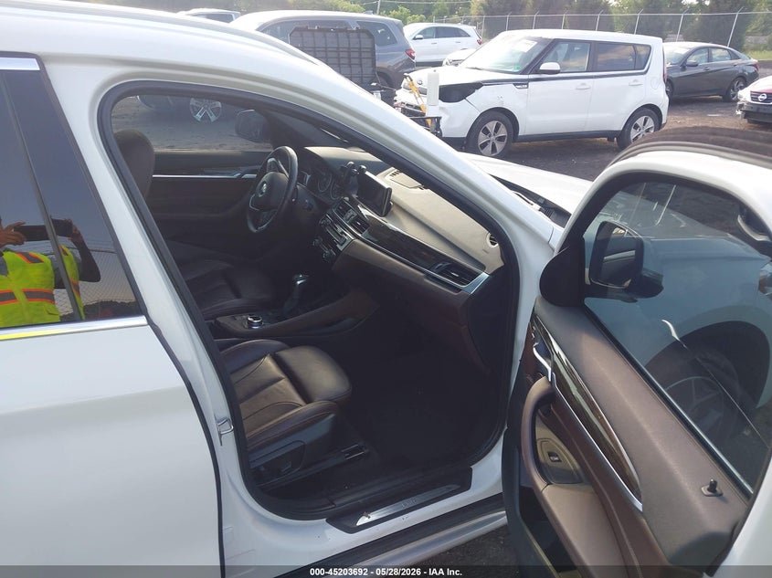 2018 BMW X1 VIN WBXHT3C31J5K22202 IAAI salvage auction — FRONT & REAR, Salvage Title, sold $3,850 on 2026-07-07 (photo 5)