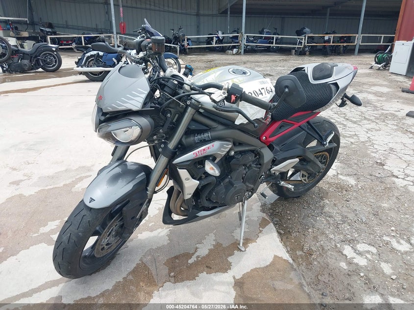 2022 Triumph motorcycle Street VIN SMTA554SXNTAY9293 IAAI salvage auction — SIDE, Salvage (Texas), sold $975 on 2026-07-28 (photo 2)