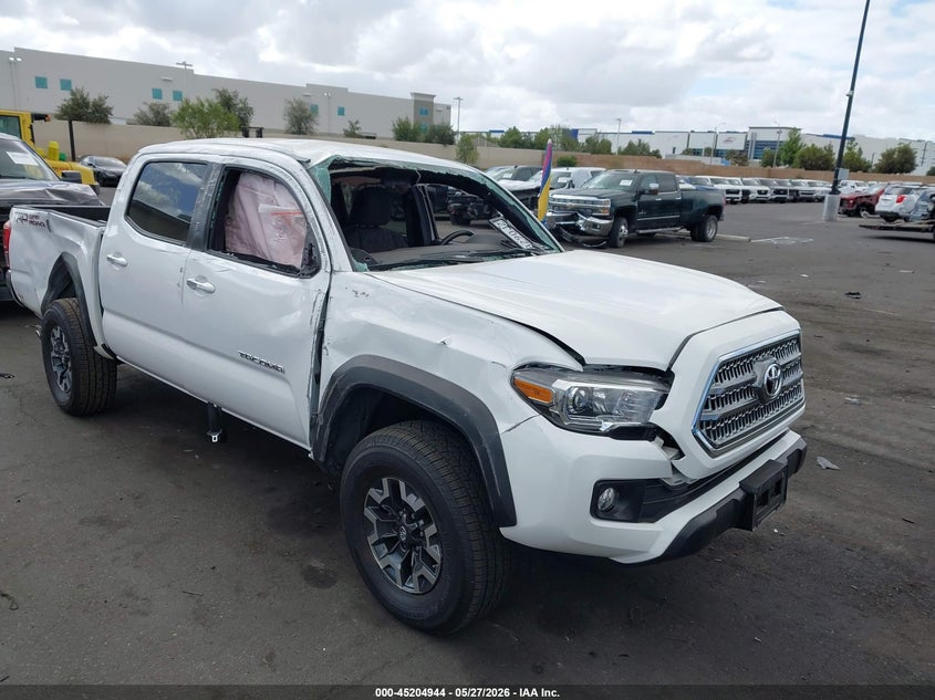 2017 Toyota Tacoma VIN 3TMAZ5CN4HM052058 IAAI salvage auction — ROLLOVER, Salvage Title, sold $5,600 on 2026-07-19 (photo 1)