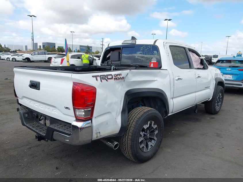 2017 Toyota Tacoma VIN 3TMAZ5CN4HM052058 IAAI salvage auction — ROLLOVER, Salvage Title, sold $5,600 on 2026-07-19 (photo 4)