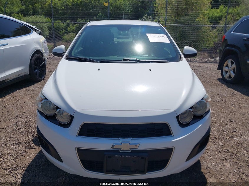 2013 Chevrolet SONIC VIN 1G1JC5SG7D4207706 IAAI salvage auction — NORMAL WEAR, Salvage Title, sold $350 on 2026-07-22 (photo 6)