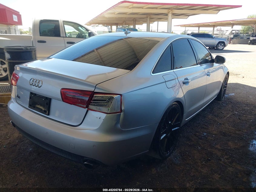 2014 Audi A6 VIN WAUDFAFCXEN027849 IAAI salvage auction — NORMAL WEAR, Restored (Arizona), sold $900 on 2026-07-07 (photo 4)
