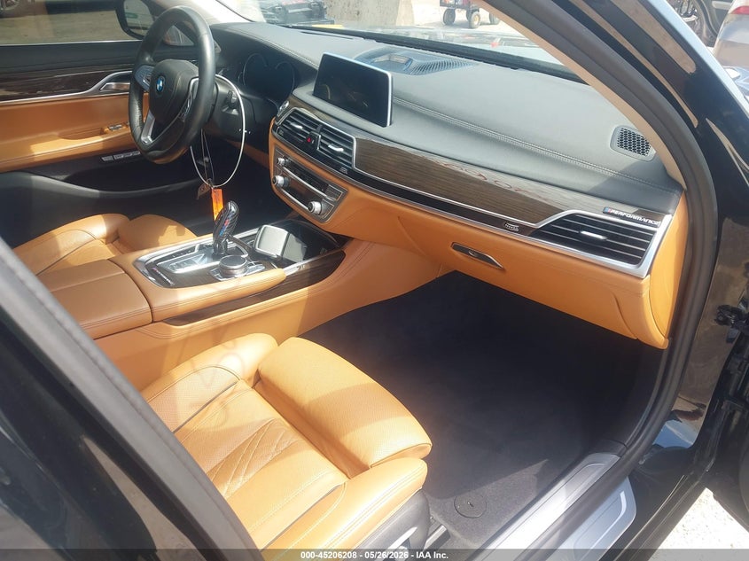 2016 BMW 7er VIN WBA7F2C58GG418515 IAAI salvage auction — LEFT FRONT, Original (Texas), sold $15,750 on 2026-08-05 (photo 5)