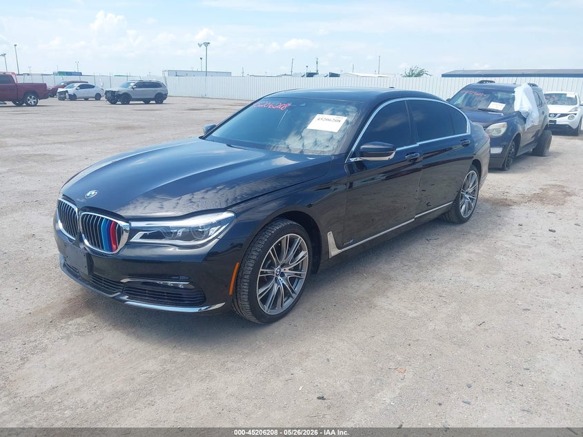 2016 BMW 7er VIN WBA7F2C58GG418515 IAAI salvage auction — LEFT FRONT, Original (Texas), sold $15,750 on 2026-08-05 (photo 6)