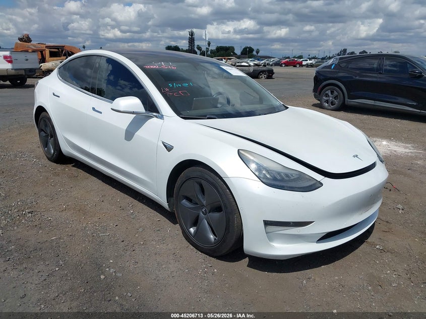 2018 Tesla Model 3 VIN 5YJ3E1EAXJF161884 IAAI salvage auction — LEFT SIDE, Salvage (California), sold $3,050 on 2026-07-21 (photo 1)