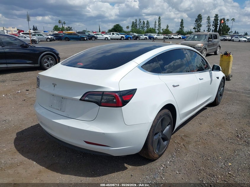 2018 Tesla Model 3 VIN 5YJ3E1EAXJF161884 IAAI salvage auction — LEFT SIDE, Salvage (California), sold $3,050 on 2026-07-21 (photo 4)