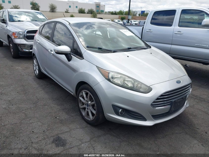 2016 Ford Fiesta VIN 3FADP4EJ5GM154710 IAAI salvage auction — LEFT SIDE, Salvage Title, sold $525 on 2026-07-31 (photo 1)