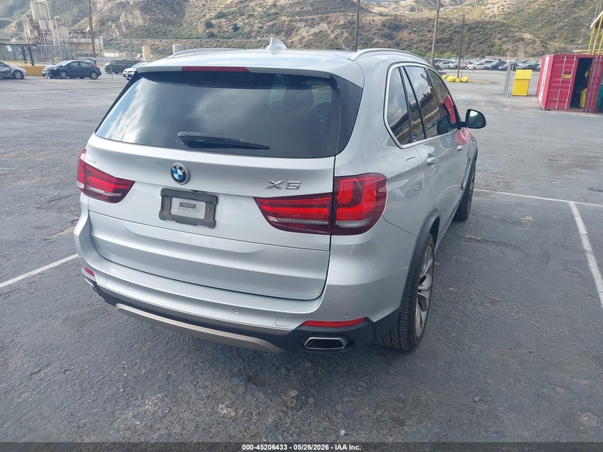 2018 BMW X5 VIN 5UXKS4C5XJ0Y17851 IAAI salvage auction — LEFT REAR, Salvage (California), sold $11,050 on 2026-07-06 (photo 4)