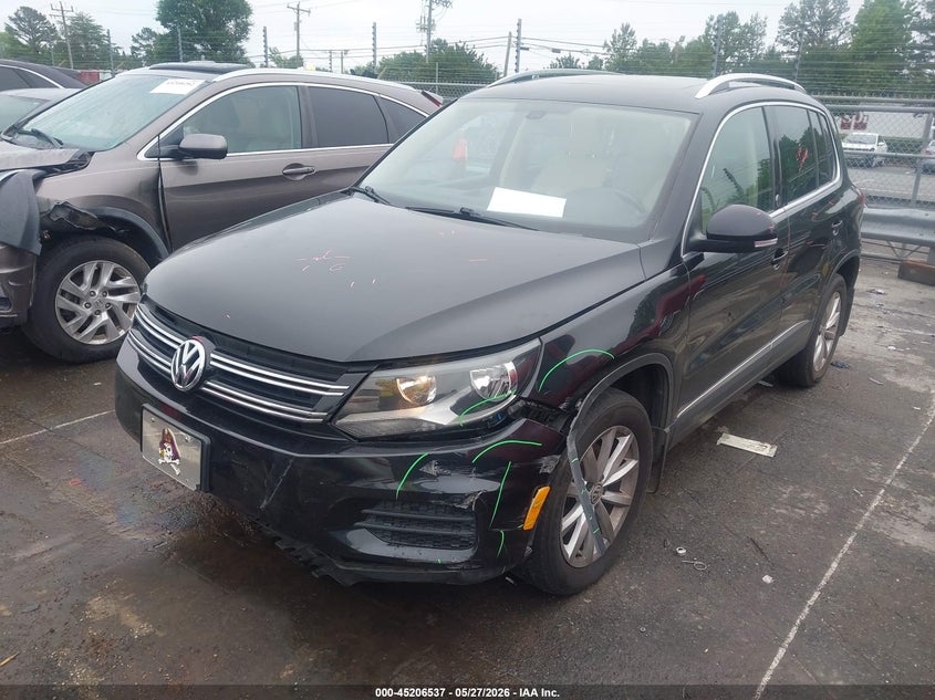 2017 Volkswagen Tiguan VIN WVGSV7AX2HK015142 IAAI salvage auction — FRONT & REAR, Salvage (Idaho), sold $1,450 on 2026-07-13 (photo 2)