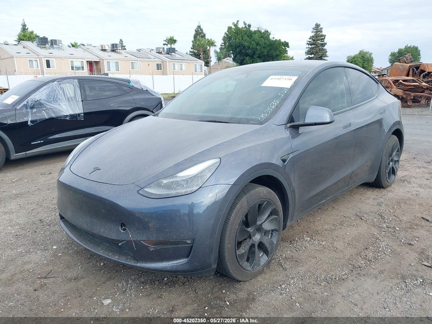 2023 Tesla Model y VIN 7SAYGDED5PF961144 IAAI salvage auction — REAR END, Salvage Title, sold $11,675 on 2026-07-07 (photo 2)