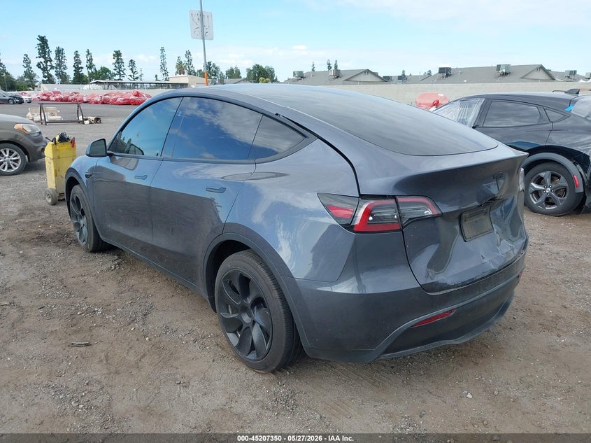 2023 Tesla Model y VIN 7SAYGDED5PF961144 IAAI salvage auction — REAR END, Salvage Title, sold $11,675 on 2026-07-07 (photo 3)