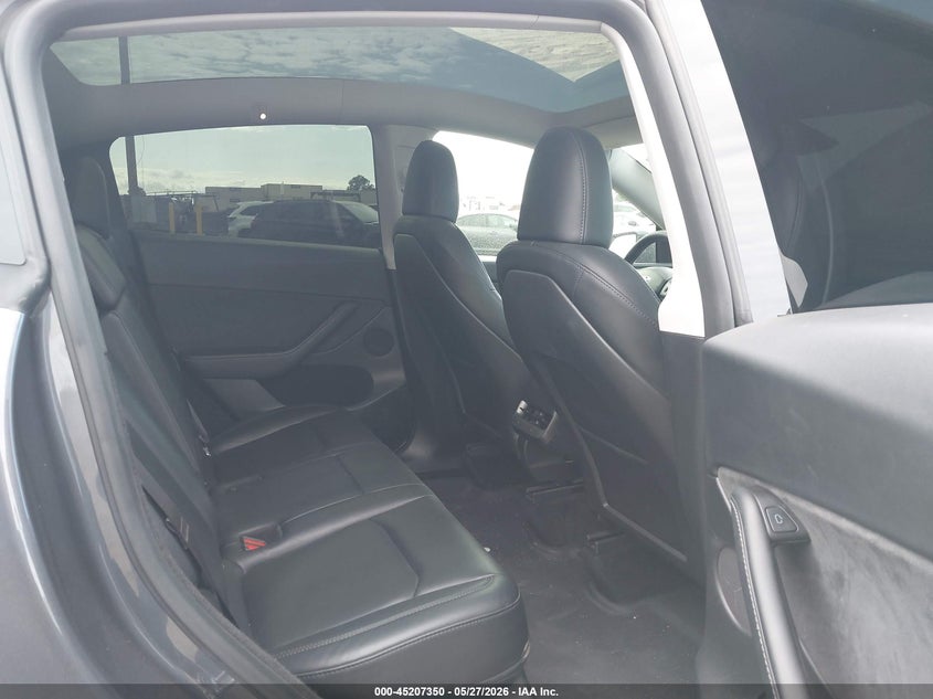 2023 Tesla Model y VIN 7SAYGDED5PF961144 IAAI salvage auction — REAR END, Salvage Title, sold $11,675 on 2026-07-07 (photo 8)