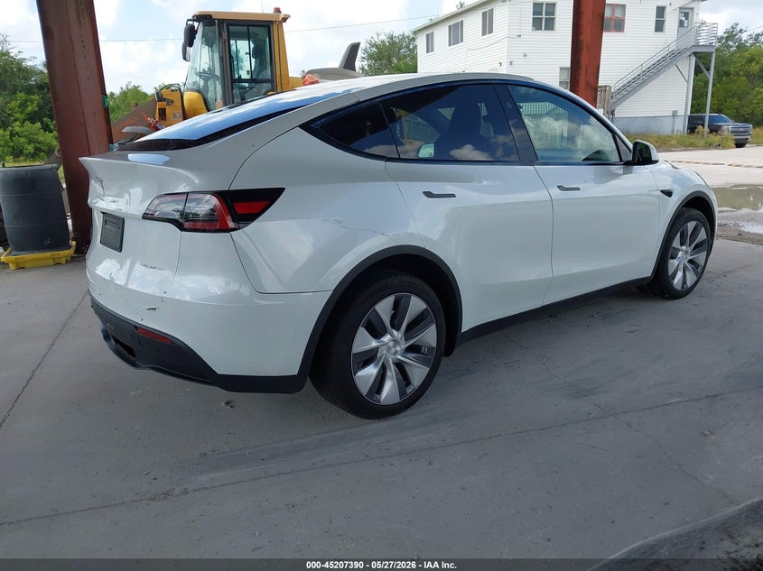 2023 Tesla Model y VIN 7SAYGDEE3PA177907 IAAI salvage auction — REAR END, Salvage Title, sold $14,900 on 2026-07-30 (photo 4)