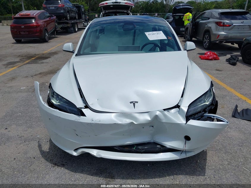 2026 Tesla Model 3 VIN 5YJ3E1EA2TF173305 IAAI salvage auction — FRONT END, Salvage Title, sold $18,600 on 2026-07-30 (photo 6)
