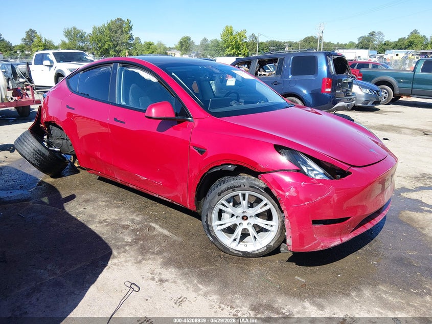 2023 Tesla Model y VIN 7SAYGDEE9PF613033 IAAI salvage auction — FRONT & REAR, Salvage Title, sold $6,600 on 2026-07-17 (photo 1)