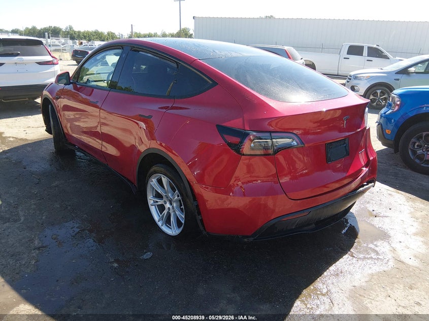 2023 Tesla Model y VIN 7SAYGDEE9PF613033 IAAI salvage auction — FRONT & REAR, Salvage Title, sold $6,600 on 2026-07-17 (photo 3)