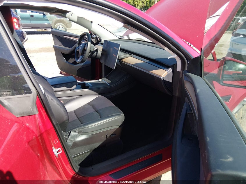 2023 Tesla Model y VIN 7SAYGDEE9PF613033 IAAI salvage auction — FRONT & REAR, Salvage Title, sold $6,600 on 2026-07-17 (photo 5)