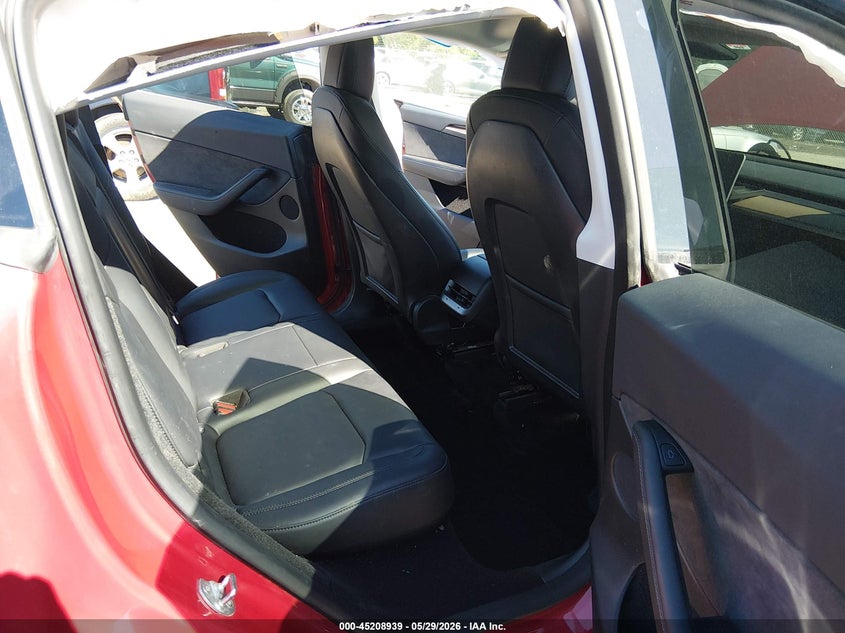 2023 Tesla Model y VIN 7SAYGDEE9PF613033 IAAI salvage auction — FRONT & REAR, Salvage Title, sold $6,600 on 2026-07-17 (photo 8)