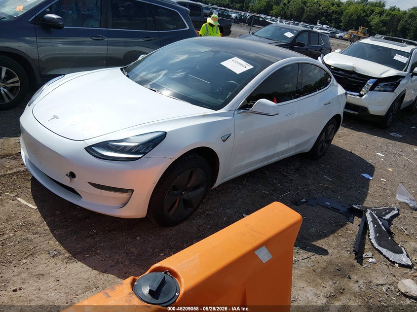2019 Tesla Model 3 VIN 5YJ3E1EB7KF451350 IAAI salvage auction — UNKNOWN, Salvage Title, sold $5,500 on 2026-07-30 (photo 2)