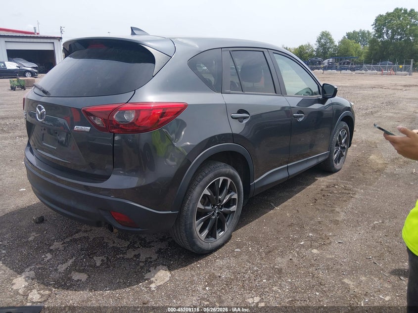 2016 Mazda Cx-5 VIN JM3KE4DY4G0904078 IAAI salvage auction — NORMAL WEAR, Clear (Montana), sold $4,350 on 2026-07-08 (photo 4)