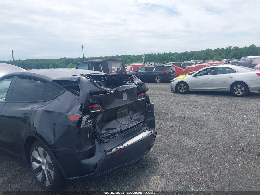 2024 Tesla Model y VIN 7SAYGDED9RF017950 IAAI salvage auction — REAR END, Salvage - Greater Than 75% (Maryland), sold $8,400 on 2026-07-23 (photo 6)