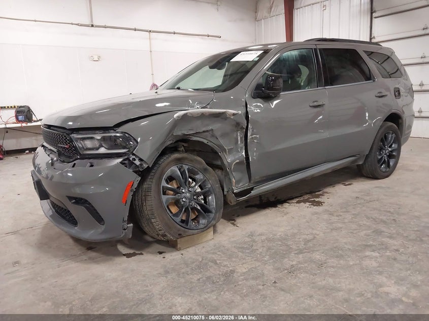 2023 Dodge Durango VIN 1C4RDJAGXPC657815 IAAI salvage auction — SIDE, Salvage (Iowa), sold $7,100 on 2026-07-28 (photo 2)