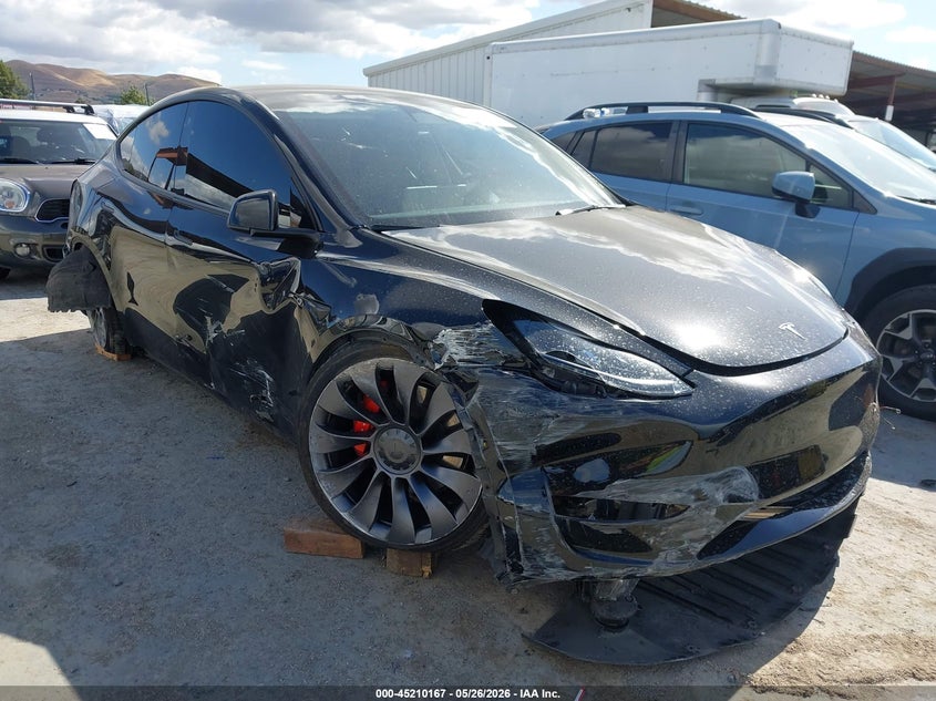 2023 Tesla Model y VIN 7SAYGDEF6PF746065 IAAI salvage auction — RIGHT FRONT, Salvage (California), sold $8,400 on 2026-07-18 (photo 1)