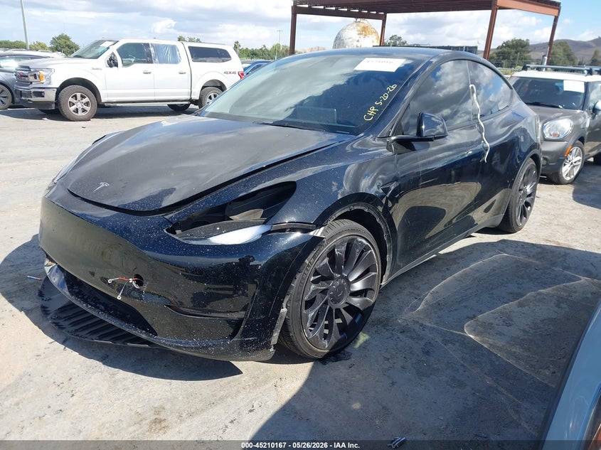 2023 Tesla Model y VIN 7SAYGDEF6PF746065 IAAI salvage auction — RIGHT FRONT, Salvage (California), sold $8,400 on 2026-07-18 (photo 2)