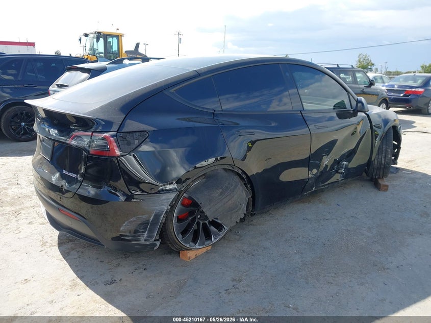 2023 Tesla Model y VIN 7SAYGDEF6PF746065 IAAI salvage auction — RIGHT FRONT, Salvage (California), sold $8,400 on 2026-07-18 (photo 4)