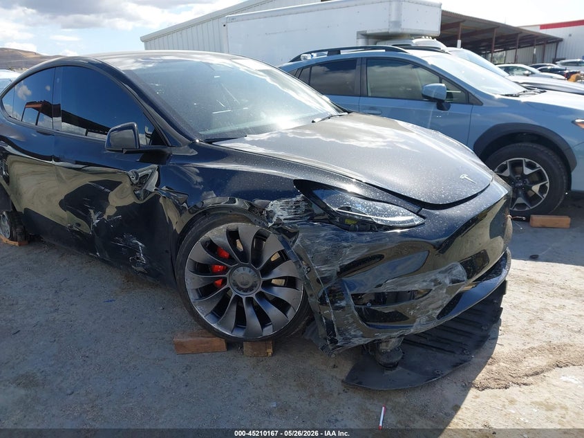 2023 Tesla Model y VIN 7SAYGDEF6PF746065 IAAI salvage auction — RIGHT FRONT, Salvage (California), sold $8,400 on 2026-07-18 (photo 6)
