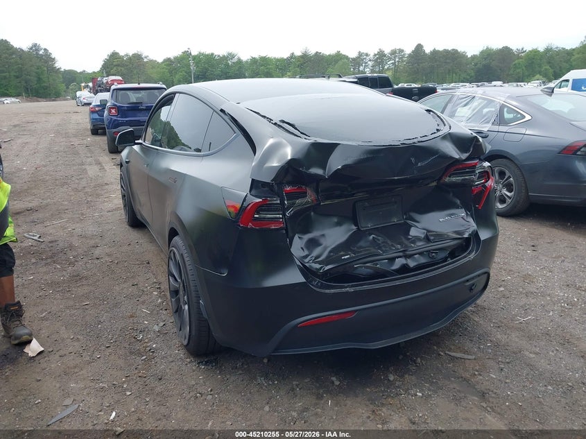 2023 Tesla Model y VIN 7SAYGDEF2PF863870 IAAI salvage auction — REAR END, Salvage Title, sold $8,100 on 2026-07-30 (photo 3)
