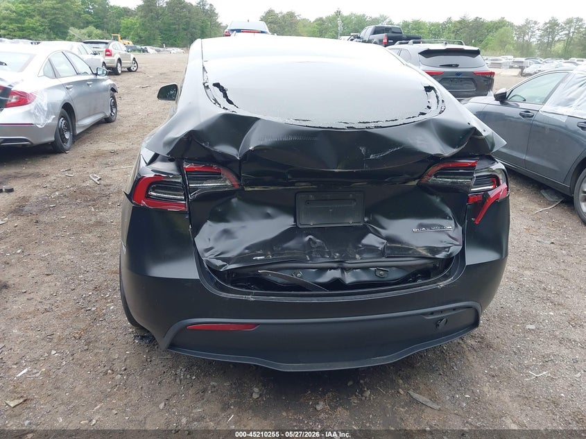 2023 Tesla Model y VIN 7SAYGDEF2PF863870 IAAI salvage auction — REAR END, Salvage Title, sold $8,100 on 2026-07-30 (photo 6)