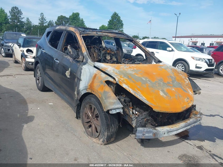 2014 Hyundai Santa fe VIN 5XYZUDLB7EG186010 IAAI salvage auction — TOTAL BURN, Salvage Title, sold $300 on 2026-07-13 (photo 1)