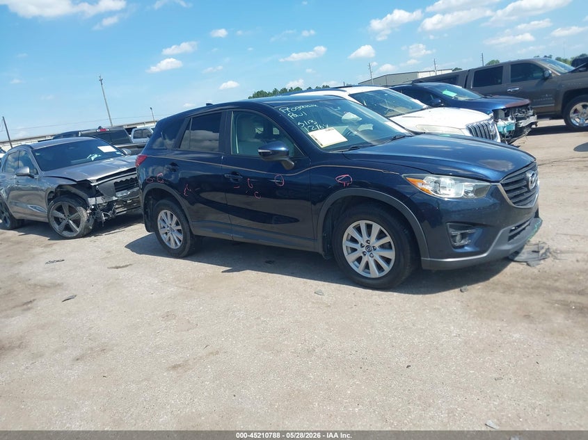 2016 Mazda Cx-5 VIN JM3KE2CY2G0764389 IAAI salvage auction — LEFT FRONT, Salvage Title, sold $3,100 on 2026-07-22 (photo 1)