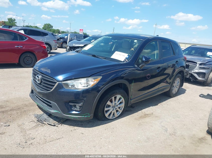 2016 Mazda Cx-5 VIN JM3KE2CY2G0764389 IAAI salvage auction — LEFT FRONT, Salvage Title, sold $3,100 on 2026-07-22 (photo 2)