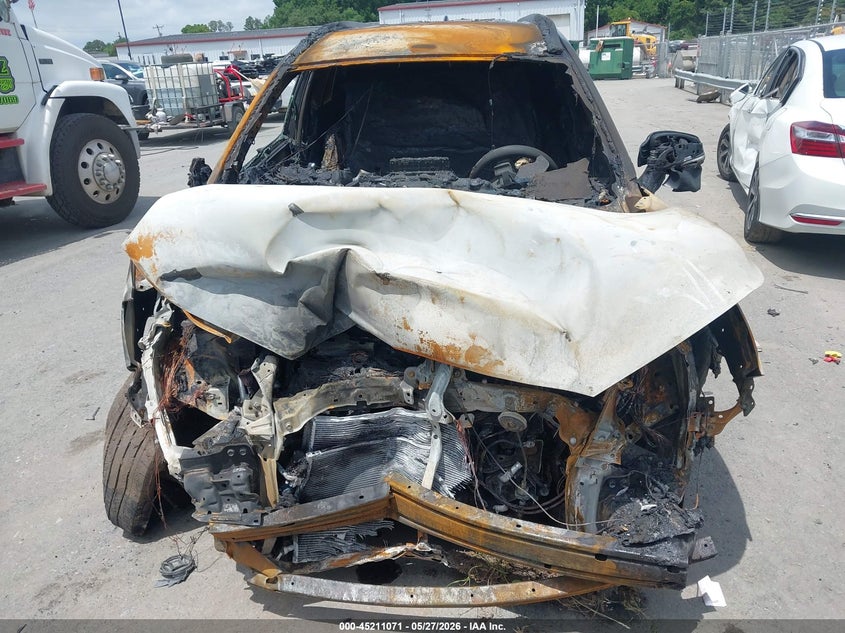 2025 Toyota Corolla cross VIN 7MUFBABG7SV074123 IAAI salvage auction — EXTERIOR BURN, Salvage (North Carolina), sold $2,350 on 2026-07-06 (photo 6)
