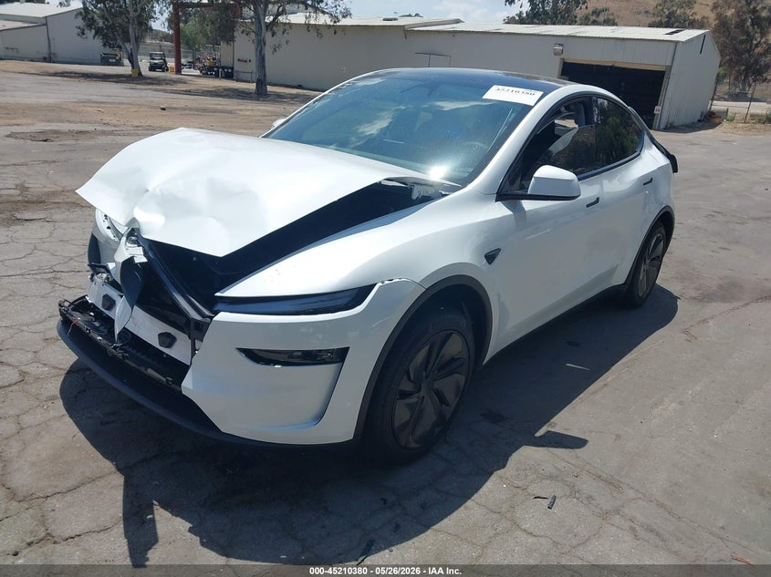 2026 Tesla Model y VIN 7SAYGDED9TF460137 IAAI salvage auction — NORMAL WEAR, Salvage (California), sold $10,000 on 2026-07-07 (photo 2)