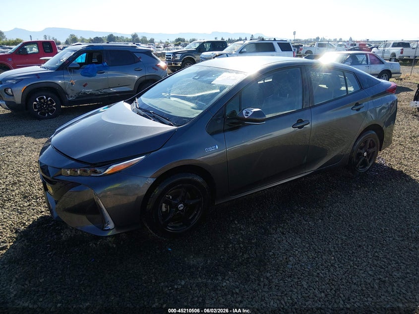 2021 Toyota Prius VIN JTDKAMFP1M3166436 IAAI salvage auction — RIGHT FRONT, Salvage (Oregon), sold $7,300 on 2026-07-27 (photo 2)