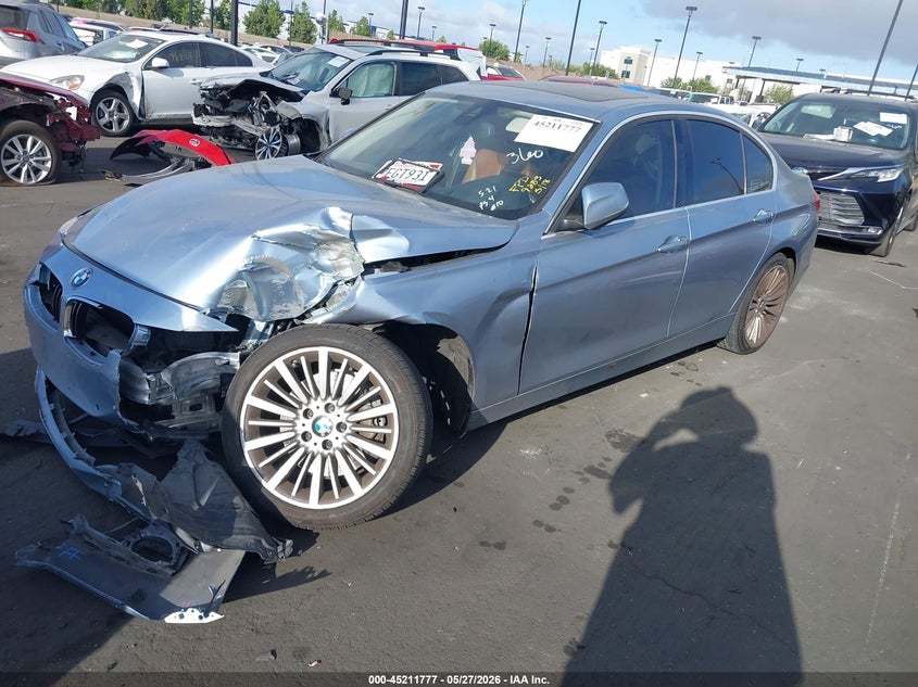 2014 BMW 3er VIN WBA3A9C59EF479283 IAAI salvage auction — LEFT FRONT, Salvage Title, sold $1,725 on 2026-07-10 (photo 2)