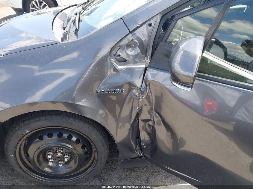 2021 Toyota Prius VIN JTDKAMFU9M3149261 IAAI salvage auction — SIDE, Salvage Title, sold $4,800 on 2026-07-23 (photo 6)