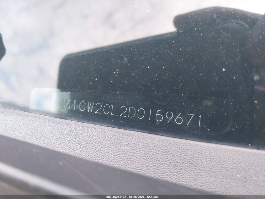 2013 Mazda 5 VIN JM1CW2CL2D0159671 IAAI salvage auction — NORMAL WEAR, Original (Texas), sold $1,300 on 2026-07-13 (photo 9)