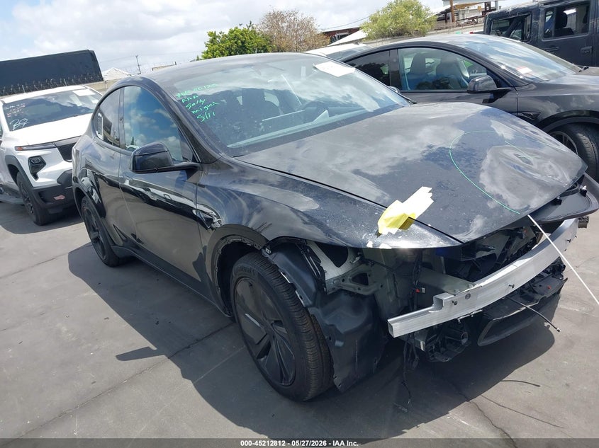 2026 Tesla Model y VIN 7SAYGDED0TF414342 IAAI salvage auction — LEFT FRONT, Salvage Title, sold $16,900 on 2026-07-15 (photo 1)