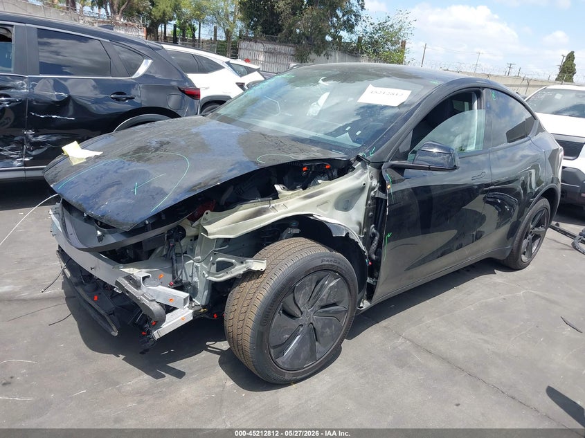 2026 Tesla Model y VIN 7SAYGDED0TF414342 IAAI salvage auction — LEFT FRONT, Salvage Title, sold $16,900 on 2026-07-15 (photo 2)