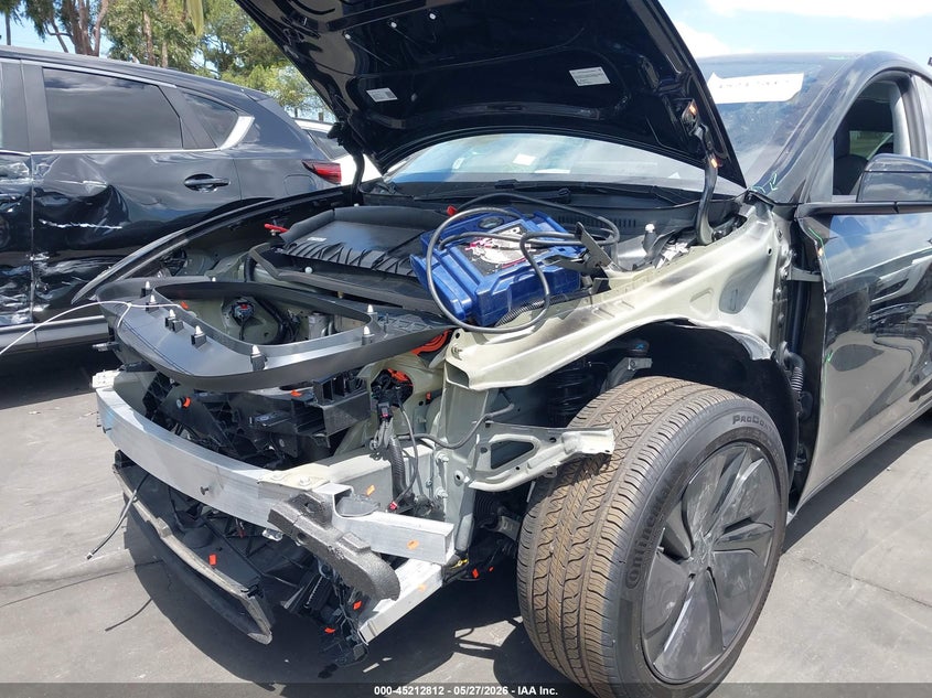 2026 Tesla Model y VIN 7SAYGDED0TF414342 IAAI salvage auction — LEFT FRONT, Salvage Title, sold $16,900 on 2026-07-15 (photo 6)