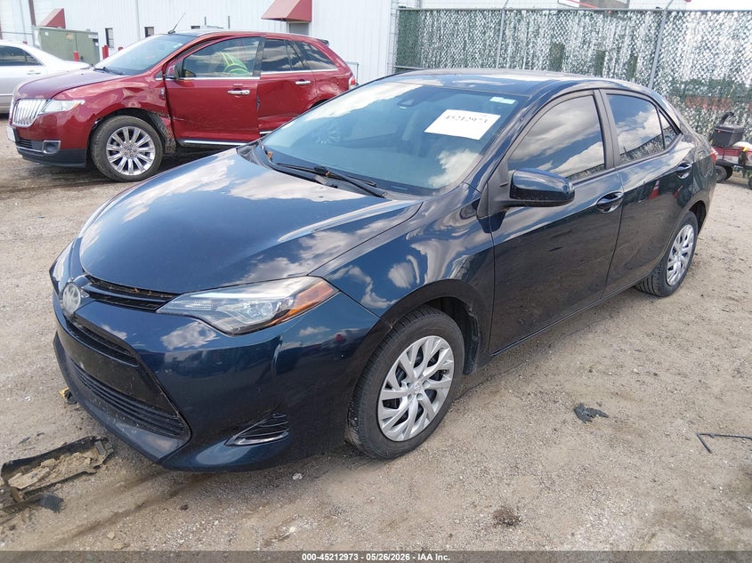 2018 Toyota Corolla VIN 5YFBURHE4JP797118 IAAI salvage auction — HAIL, Salvage (Kansas), sold $3,400 on 2026-07-31 (photo 2)