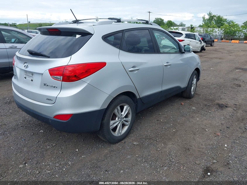 2012 Hyundai Tucson VIN KM8JUCAC3CU420556 IAAI salvage auction — NORMAL WEAR, Salvage Title, sold $975 on 2026-07-27 (photo 4)