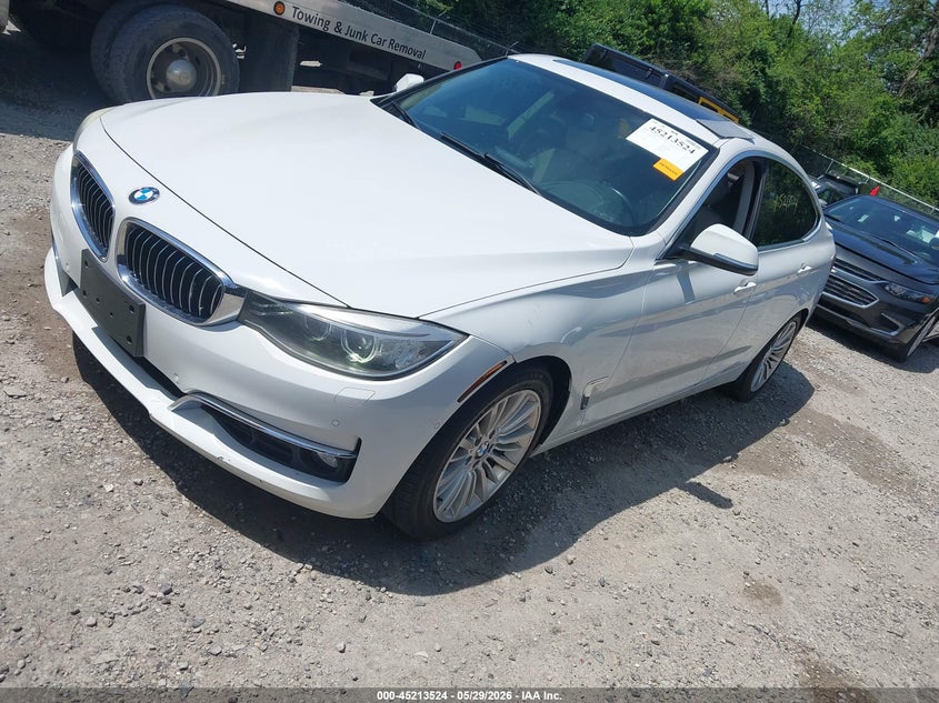 2015 BMW 3er VIN WBA3X9C58FD868427 IAAI salvage auction — FRESH WATER, Salvage Title, sold $350 on 2026-07-28 (photo 2)