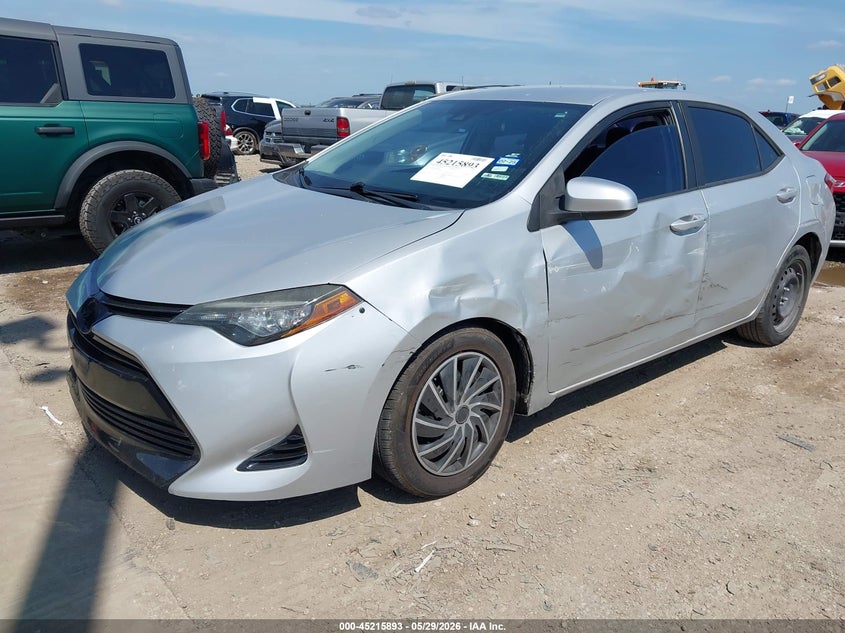 2017 Toyota Corolla VIN 5YFBURHE6HP638403 IAAI salvage auction — LEFT SIDE, Original (Texas), sold $4,250 on 2026-07-07 (photo 2)